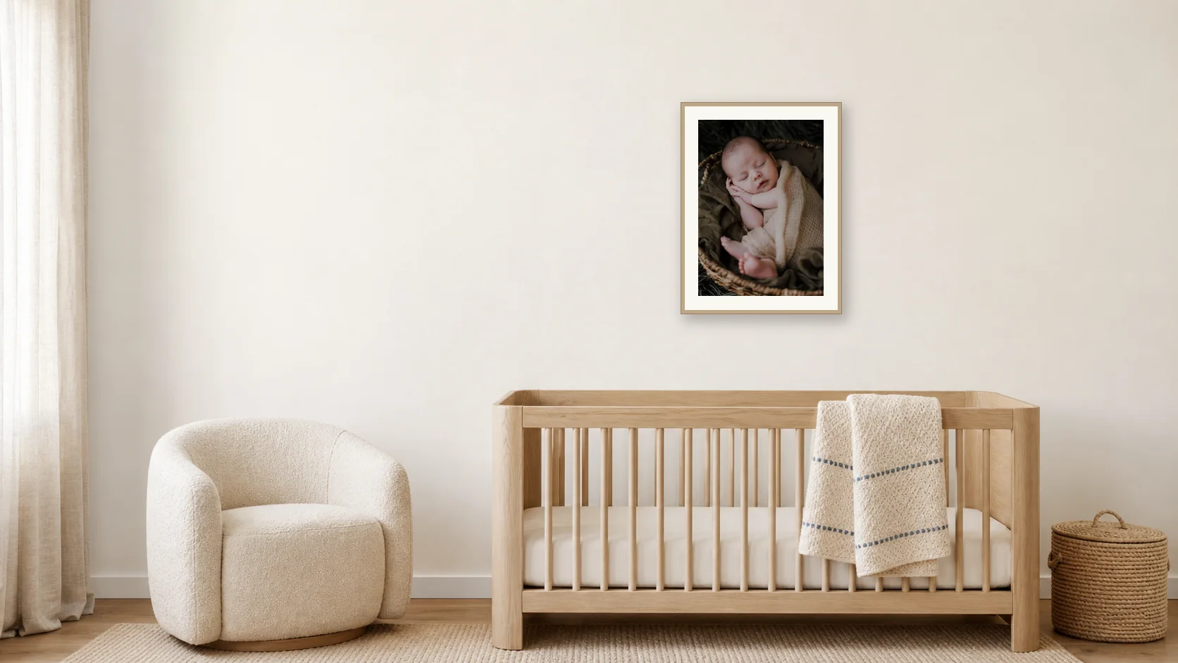 A newborn portrait above a timber crib